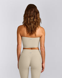 SoftMotion™ Bandeau Mid Vest with Built in Bra Shelf with Grey Logo | Oatmeal