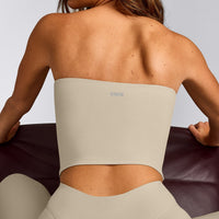 SoftMotion™ Bandeau Mid Vest with Built in Bra Shelf with Grey Logo | Oatmeal