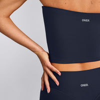 SoftMotion™ Bandeau Mid Vest with Built in Bra Shelf with Grey Logo | True Blue