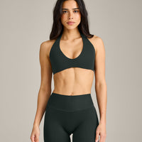 SoftMotion™ Minimal Halter Neck Bralette with Grey Logo | Emerald Noir
