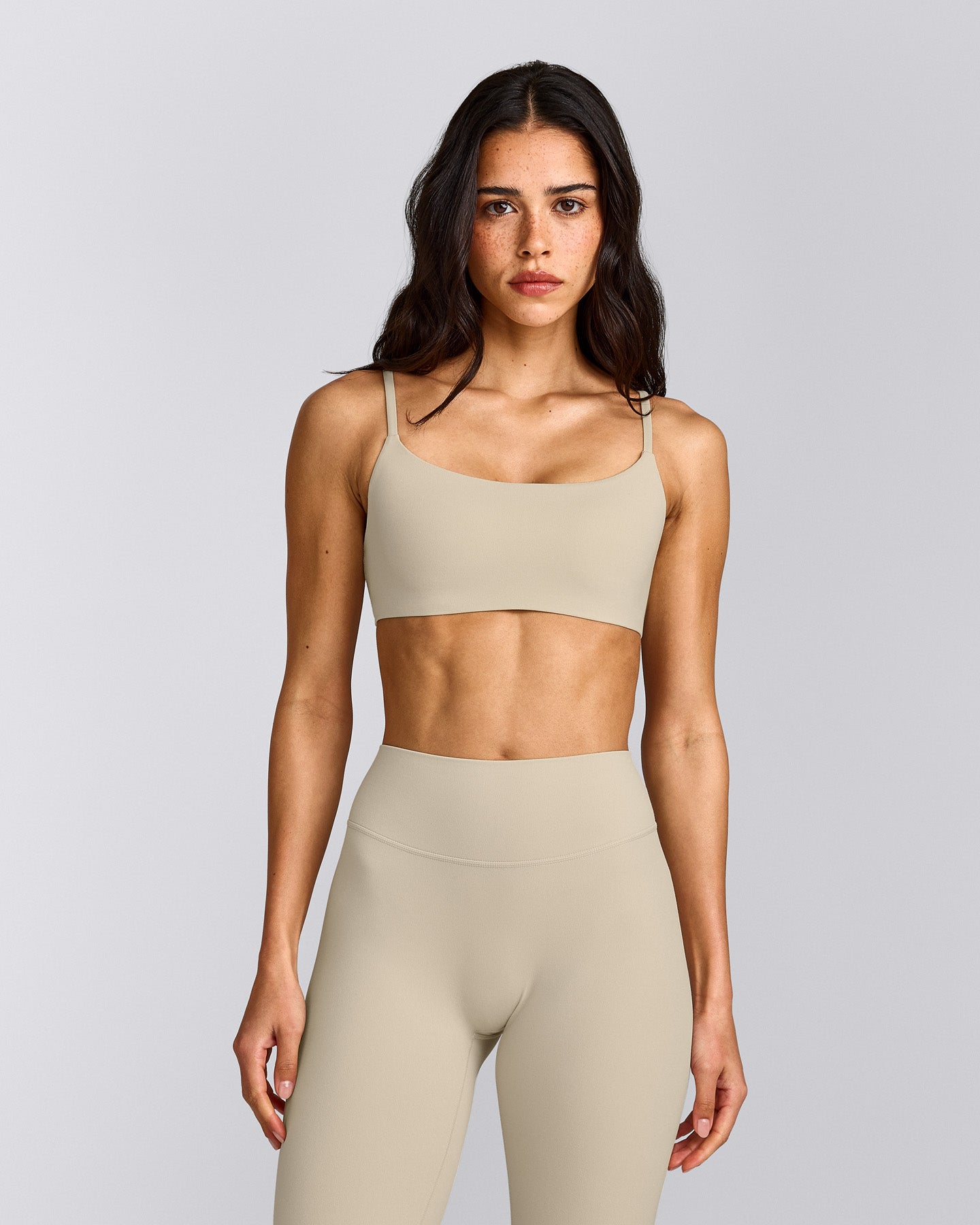 SoftMotion™ Strappy Sports Bra with Grey Logo | Oatmeal