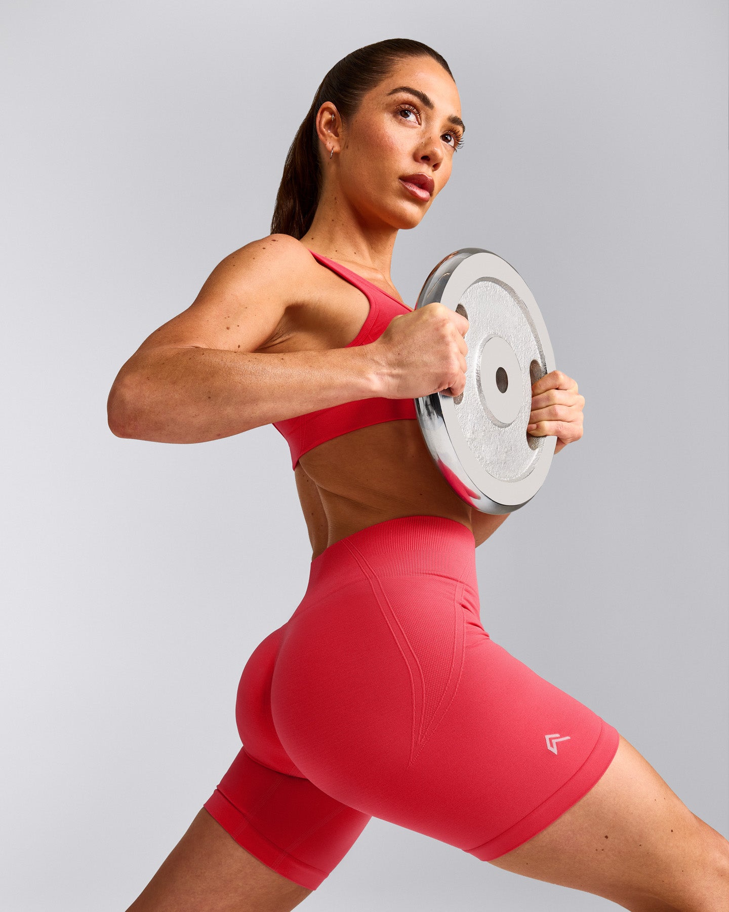 EffortlessLift™ Seamless Mid Rise Shorts with Grey Logo | Charged Pink