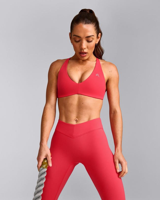 UnifiedMove™ Cross Back Sports Bra with Reflective Logo | Charged Pink