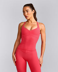 UnifiedMove™ T Back Mid Vest with Built in Bra Shelf with Reflective Logo | Charged Pink