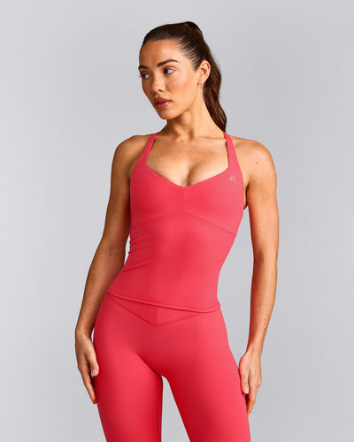 UnifiedMove™ T Back Mid Vest with Built in Bra Shelf with Reflective Logo | Charged Pink