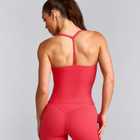 UnifiedMove™ T Back Mid Vest with Built in Bra Shelf with Reflective Logo | Charged Pink