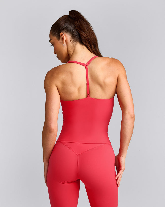 UnifiedMove™ T Back Mid Vest with Built in Bra Shelf with Reflective Logo | Charged Pink