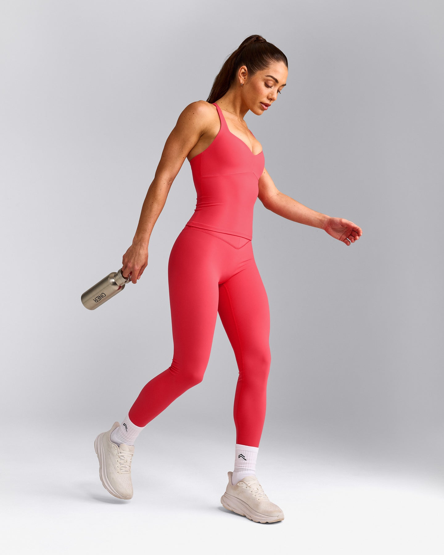UnifiedMove™ T Back Mid Vest with Built in Bra Shelf with Reflective Logo | Charged Pink