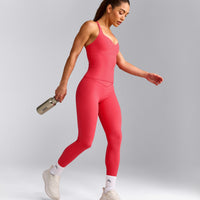 UnifiedMove™ T Back Mid Vest with Built in Bra Shelf with Reflective Logo | Charged Pink
