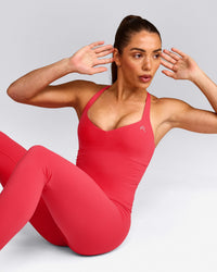 UnifiedMove™ T Back Mid Vest with Built in Bra Shelf with Reflective Logo | Charged Pink