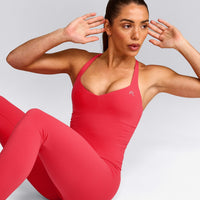 UnifiedMove™ T Back Mid Vest with Built in Bra Shelf with Reflective Logo | Charged Pink