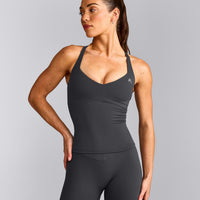 UnifiedMove™ T Back Mid Vest with Built in Bra Shelf with Reflective Logo | Coal