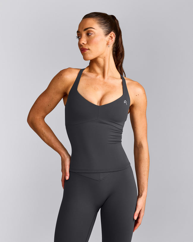 UnifiedMove™ T Back Mid Vest with Built in Bra Shelf with Reflective Logo | Coal