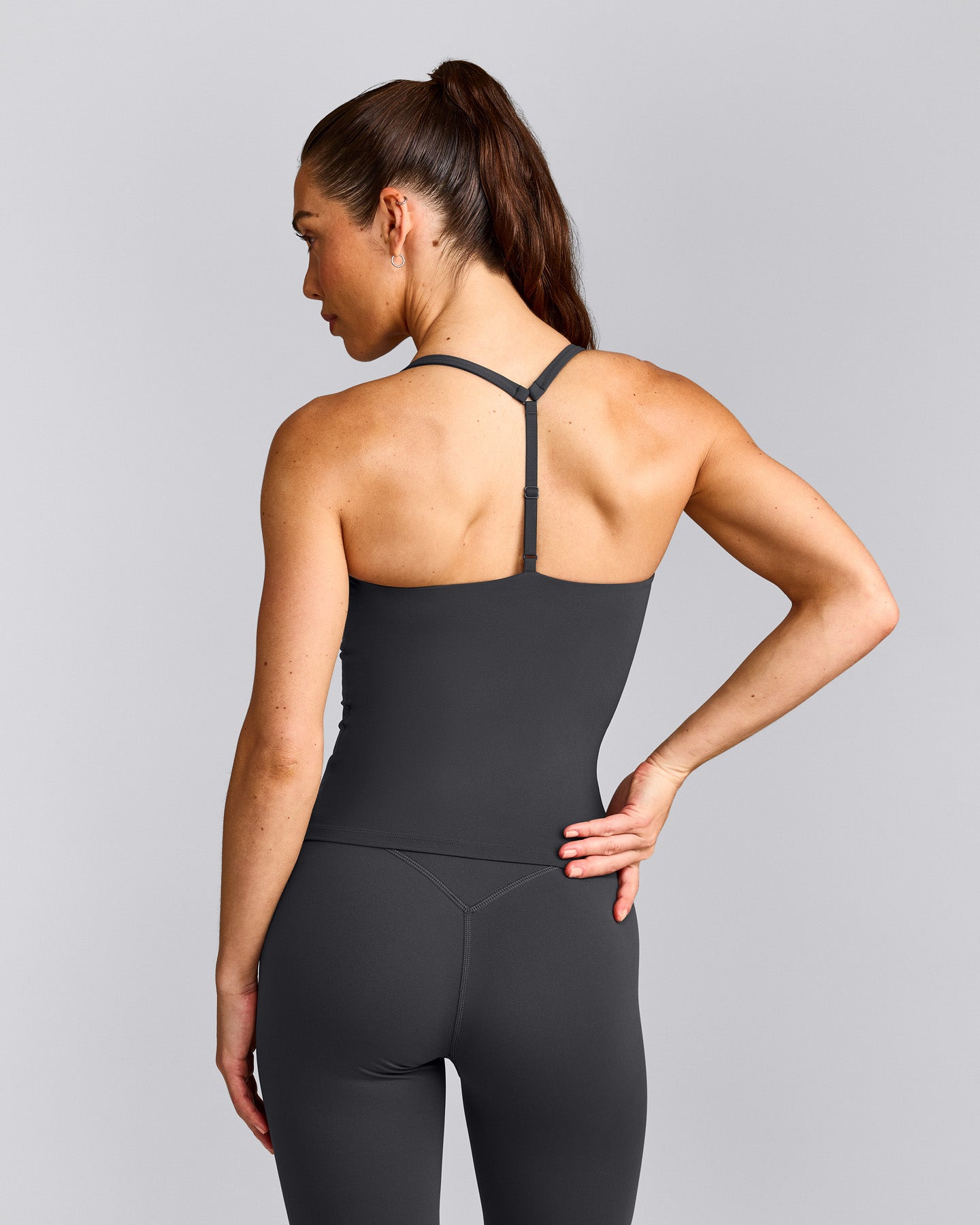 UnifiedMove™ T Back Mid Vest with Built in Bra Shelf with Reflective Logo | Coal