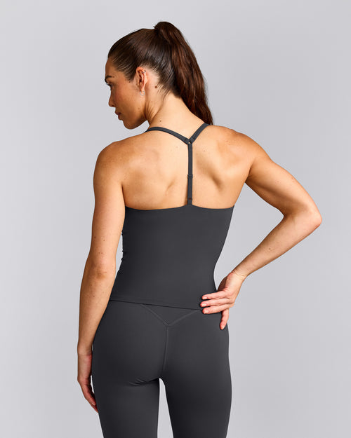 UnifiedMove™ T Back Mid Vest with Built in Bra Shelf with Reflective Logo | Coal