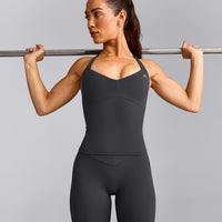 UnifiedMove™ T Back Mid Vest with Built in Bra Shelf with Reflective Logo | Coal