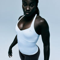 UnifiedMove™ T Back Mid Vest with Built in Bra Shelf with Reflective Logo | White