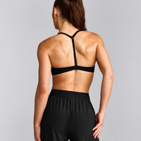UnifiedMove™ T Back Minimal Bralette with Reflective Logo | Black