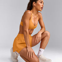 UnifiedMove™ T Back Minimal Bralette with Reflective Logo | Powdered Orange