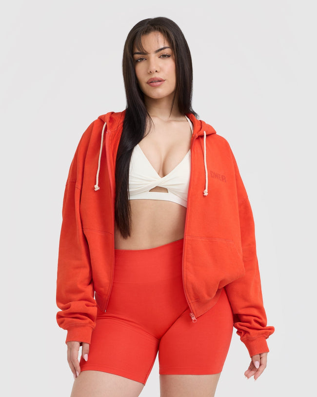 Orange zip up top outlet