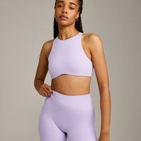 SoftMotion™ High Neck Sports Bra with Grey Logo | Lavender Purple
