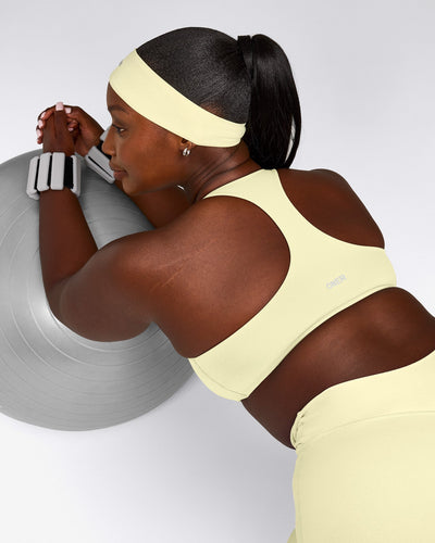 SoftMotion™ Bralette with Grey Logo | Pastel Yellow