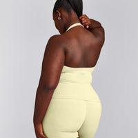 SoftMotion™ Halter Neck Vest with Built in Bra Shelf with Grey Logo | Pastel Yellow