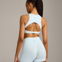 SoftMotion™ High Neck Sports Bra with Grey Logo |  Cloud Blue