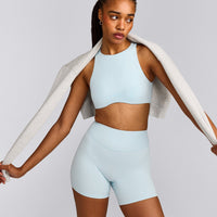 SoftMotion™ High Neck Sports Bra with Grey Logo |  Cloud Blue
