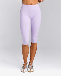 SoftMotion™ High Waisted Capri Leggings with Grey Logo | Lavender Purple