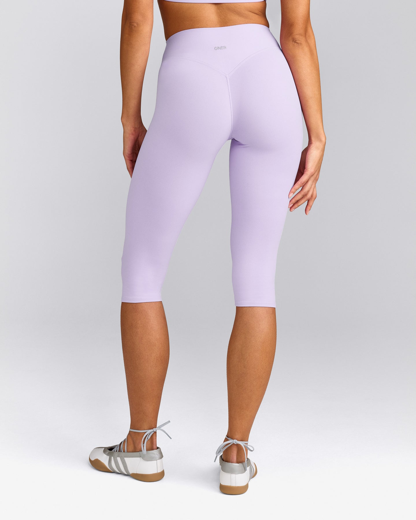 SoftMotion™ High Waisted Capri Leggings with Grey Logo | Lavender Purple