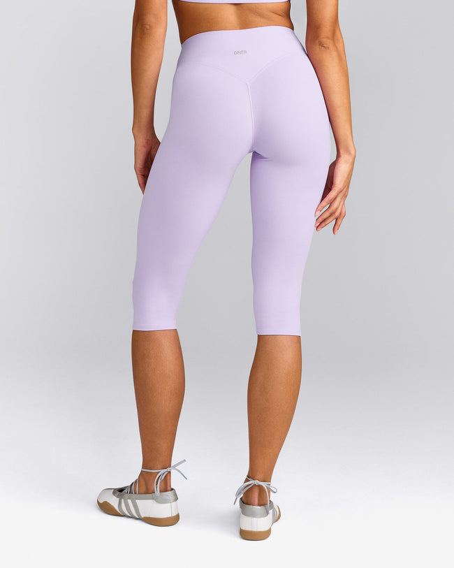 SoftMotion™ High Waisted Capri Leggings with Grey Logo | Lavender Purple