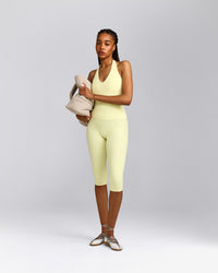 SoftMotion™ High Waisted Capri Leggings with Grey Logo | Pastel Yellow