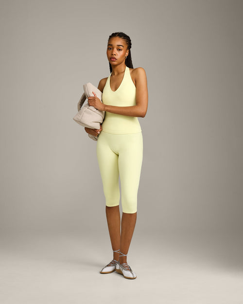 SoftMotion™ High Waisted Capri Leggings with Grey Logo | Pastel Yellow