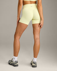 SoftMotion™ High Waisted Shorts 6" with Grey Logo | Pastel Yellow