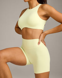 SoftMotion™ High Waisted Shorts 6" with Grey Logo | Pastel Yellow