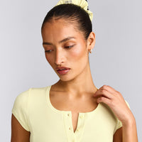 SoftMotion™ Scrunchie with Grey Logo | Pastel Yellow