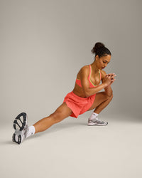 AirMove™ Lined Shorts 4" with Pocket New Branding | Light Charged Coral