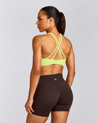 EasyLift™ High Neck Sports Bra with Grey Logo | Citrus Green