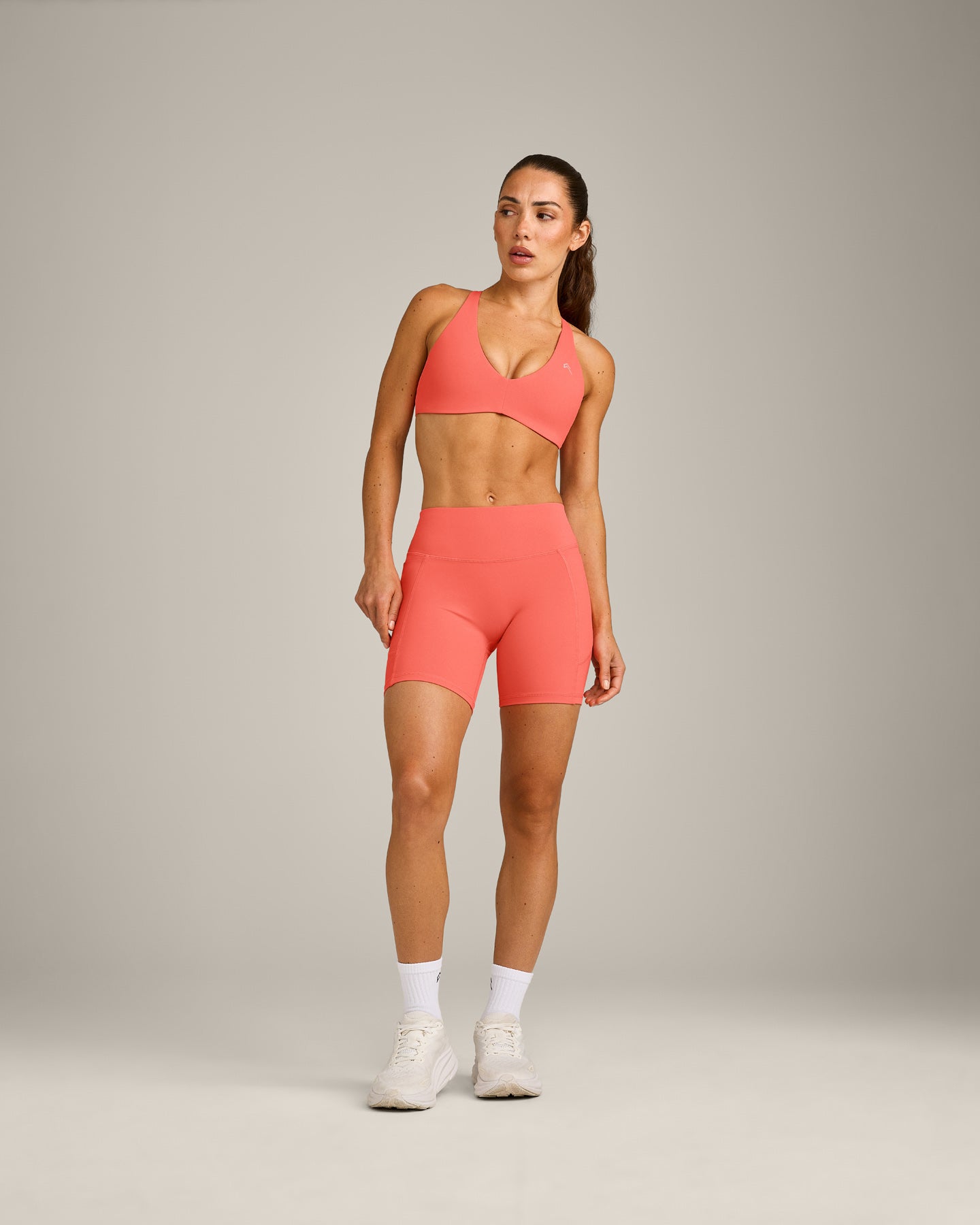 UnifiedMove™ Cross Back Sports Bra with Reflective Logo | Light Charged Coral