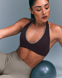 SoftMotion™ Minimal Halter Neck Bralette with Grey Logo | Dark Umber Brown