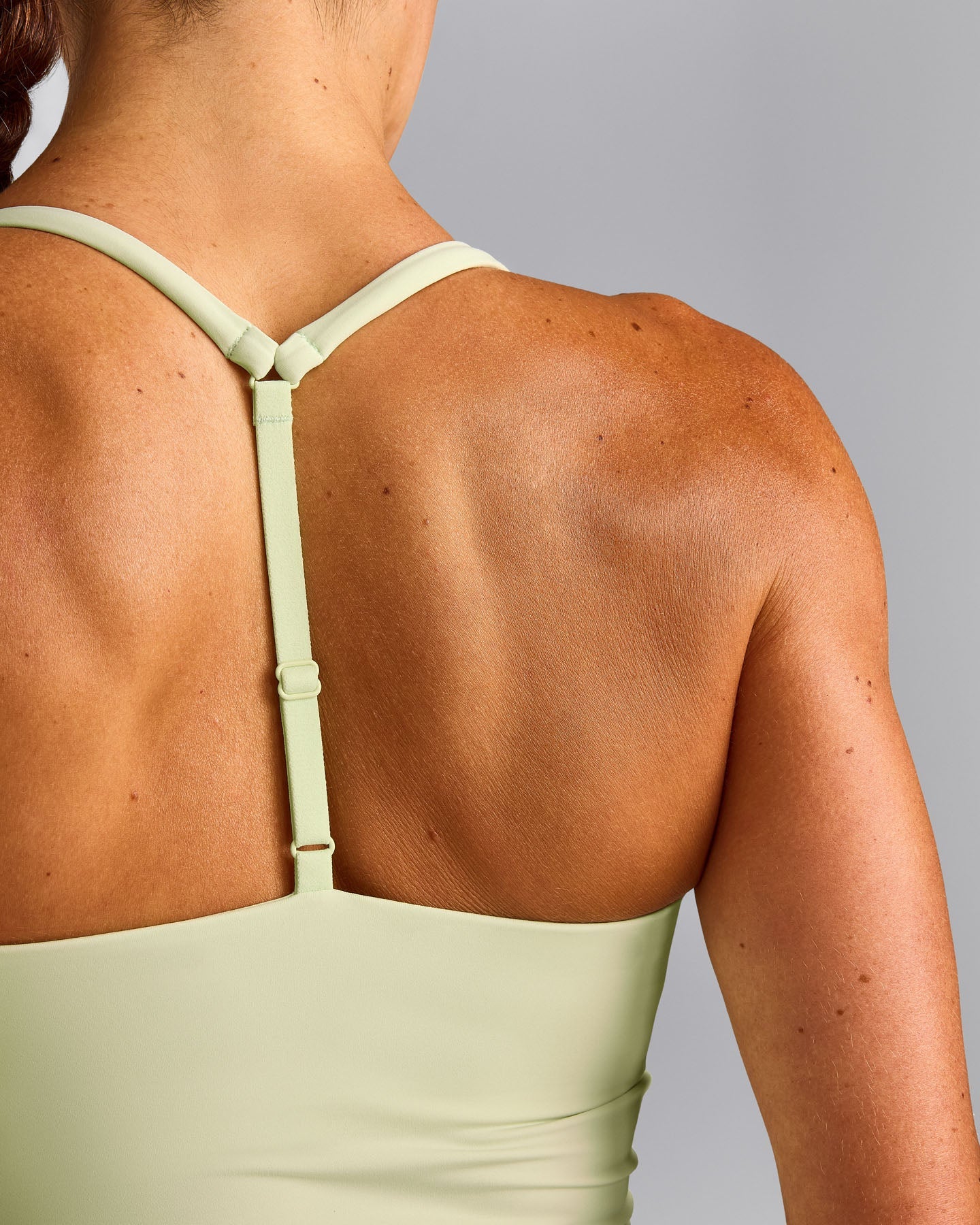 UnifiedMove™ T Back Mid Vest with Built in Bra Shelf New Branding | Meadow Mist Green