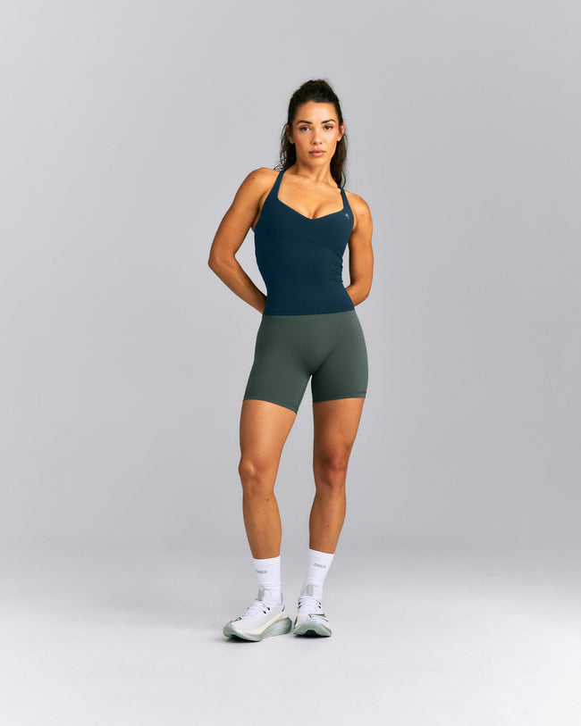 UnifiedMove™ T Back Mid Vest with Gel Pockets and Built in Bra Shelf | Oil Blue