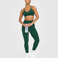 EnhanceLift™ Seamless Strappy Sports Bra with White Logo | Racing Green