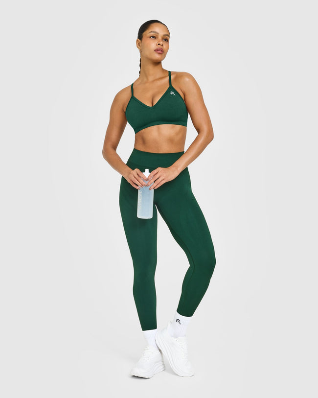 EnhanceLift™ Seamless Strappy Sports Bra with White Logo | Racing Green