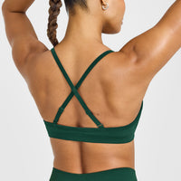 EnhanceLift™ Seamless Strappy Sports Bra with White Logo | Racing Green
