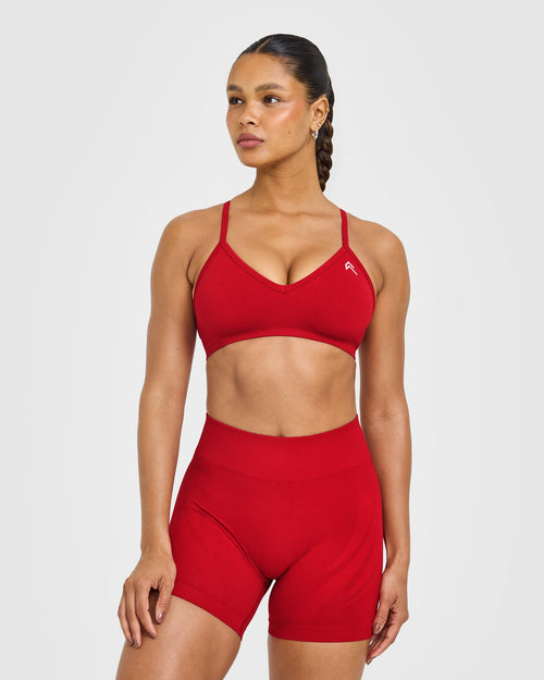 Oner Modal EnhanceLift™ Seamless Strappy Sports Bra with White Logo | Light Toasted Red