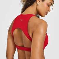 SoftMotion™ High Neck Sports Bra with White Logo | Light Toasted Red