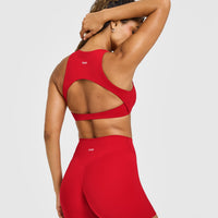 SoftMotion™ High Neck Sports Bra with White Logo | Light Toasted Red