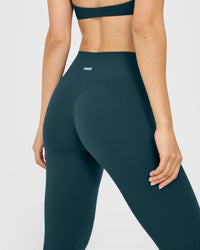 SoftMotion™ High Waisted Leggings with White Logo | Oil Blue